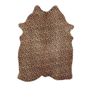 Tapis peau de vache à poils léopard